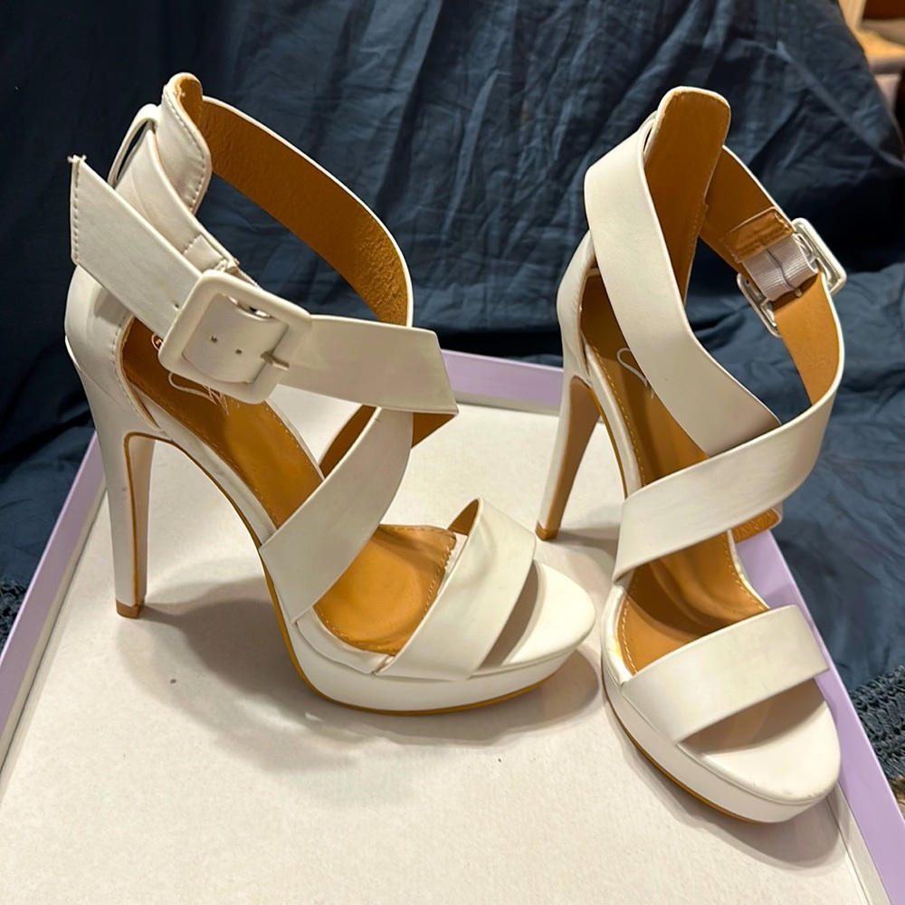 7.5 chic white heels.